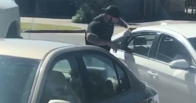 Loud Mouthed Tough Guy Gets Punched Through a Car's Window - Barnorama